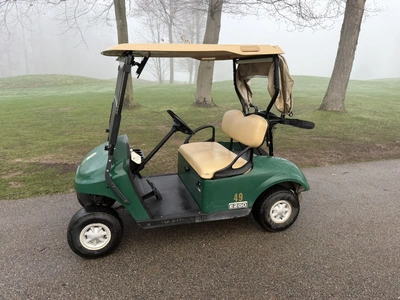 (1) 2017 E-Z-Go golf cart with a Kawasaki gas engine, model 625111G01, includes canopy, ball cover, ...