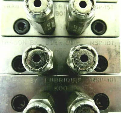 NEW LUBRIQUIP 5477530 VALVE DIVIDER 5 STACK