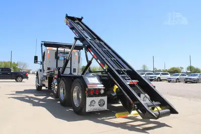 New | in-Stock 2027 PETERBILT 548 Rolloff Trucks Texas US | Roll Off Truck World #1492012