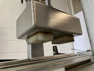 Pneumatic Press on Chain Conveyor