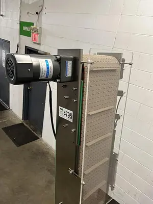 Automatic Cap Elevator