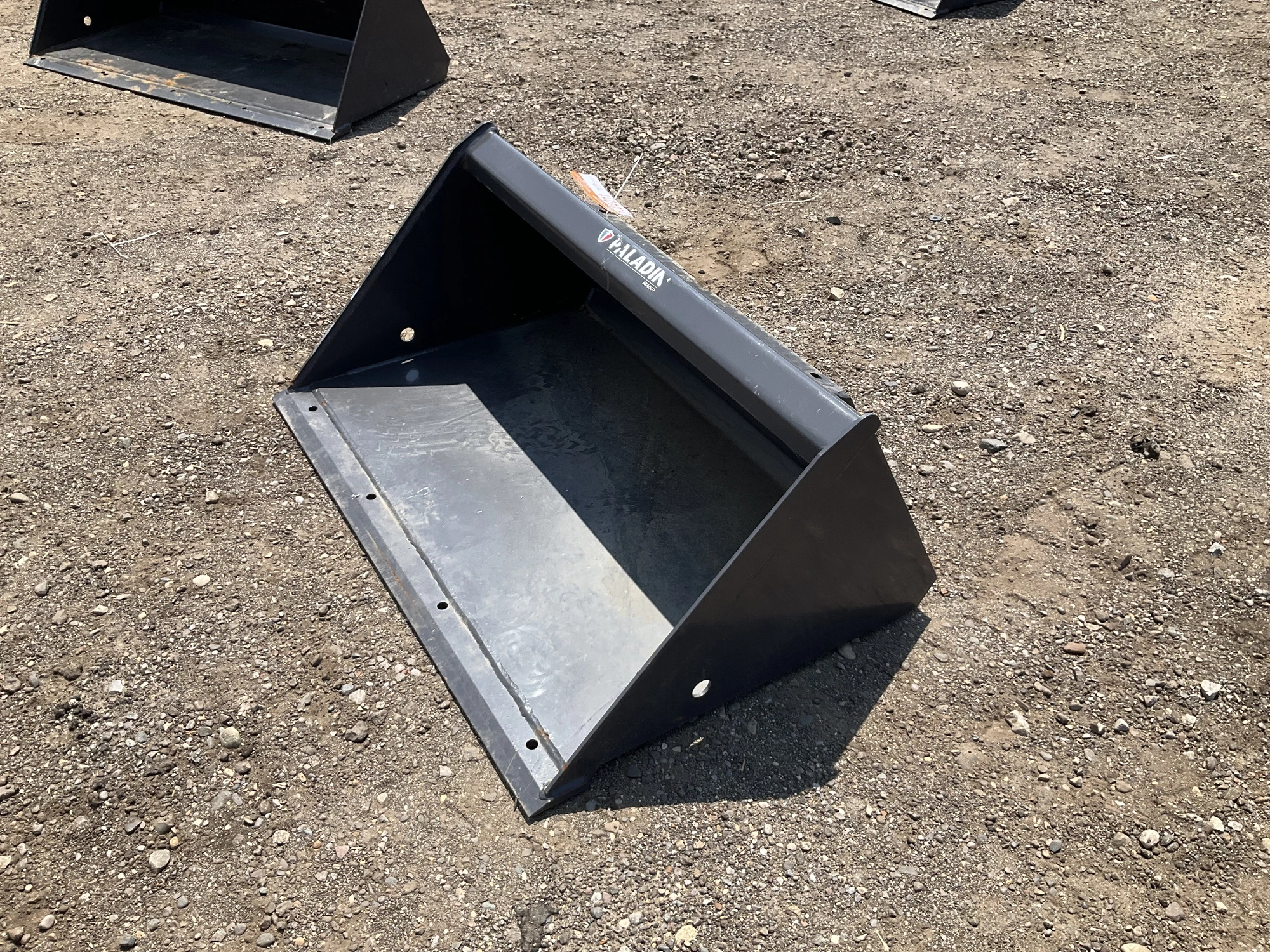 New old stock Paladin 36” smooth bucket for a mini skid steer, welded on cutting edge, mini skid ste...
