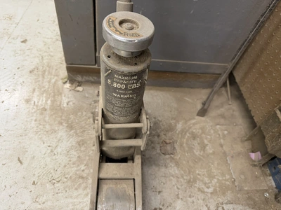 (1) Maximum heavy duty 8800 lb. forklift jack, (2) Simplex 85A, 5-ton capacity jacks.