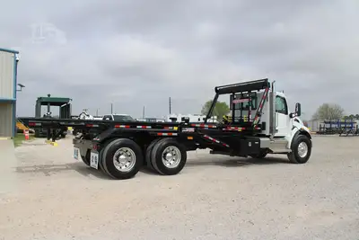 New | in-Stock 2027 PETERBILT 548 Rolloff Trucks Texas US | Roll Off Truck World #1492003