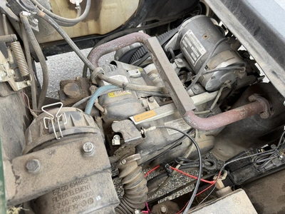 (1) 2015 E-Z-Go golf cart with a Kawasaki gas engine, includes Club Clear club and ball washer, does...