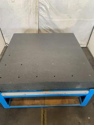 60" X 60" X 8-1/4" GRANITE SURFACE TABLE. STOCK # 1165023.