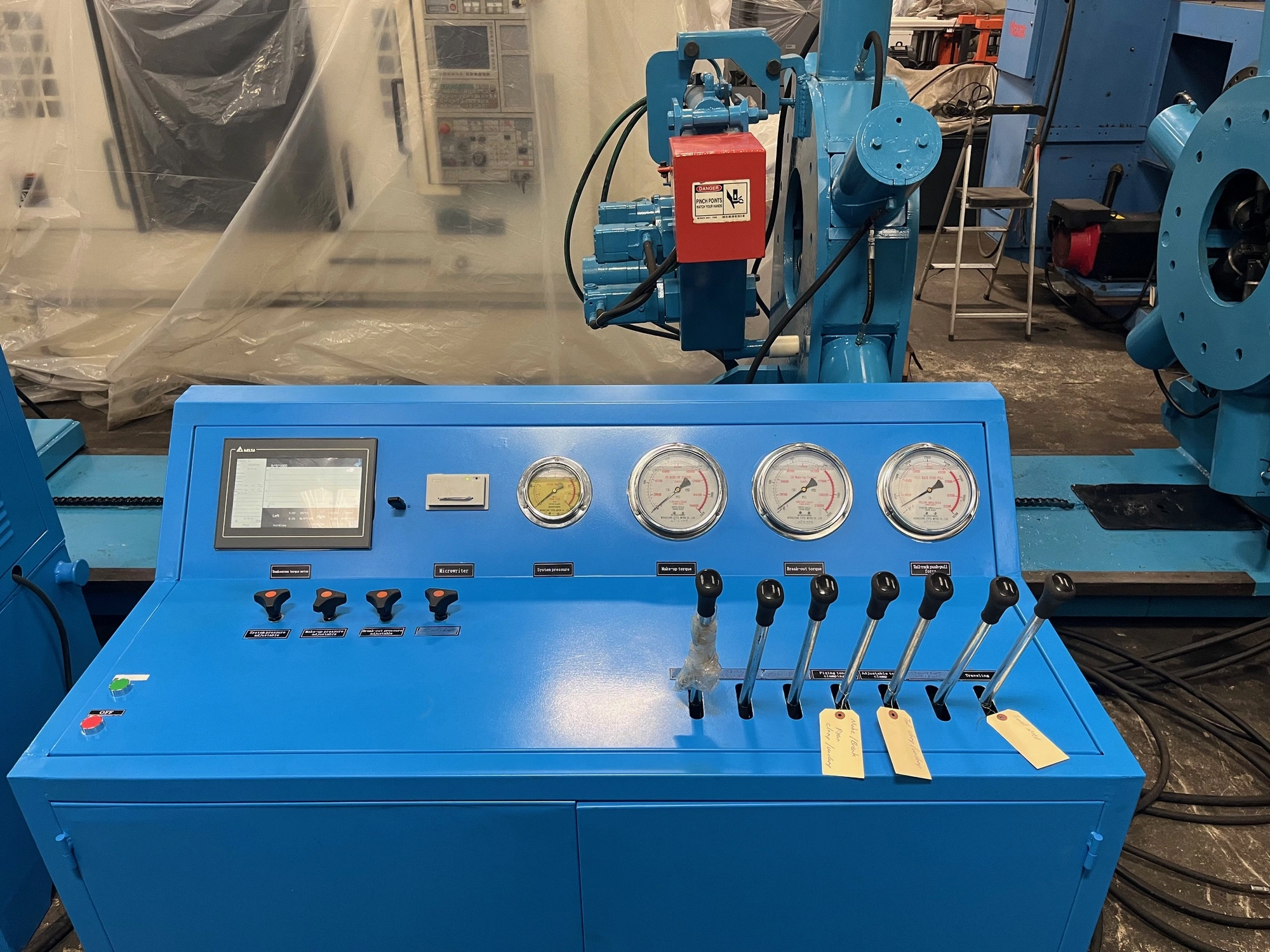 Prescott Torque Unit Make up Break Out Machine