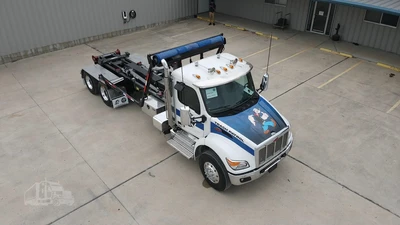Used 2027 PETERBILT 548 Hooklifts & Roll-Offs Texas US | Roll Off Truck World #1491992