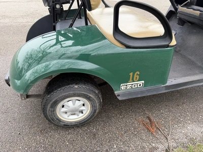 (1) 2015 E-Z-Go golf cart with a Kawasaki gas engine, includes ball washer and Club canopy, ball cov...