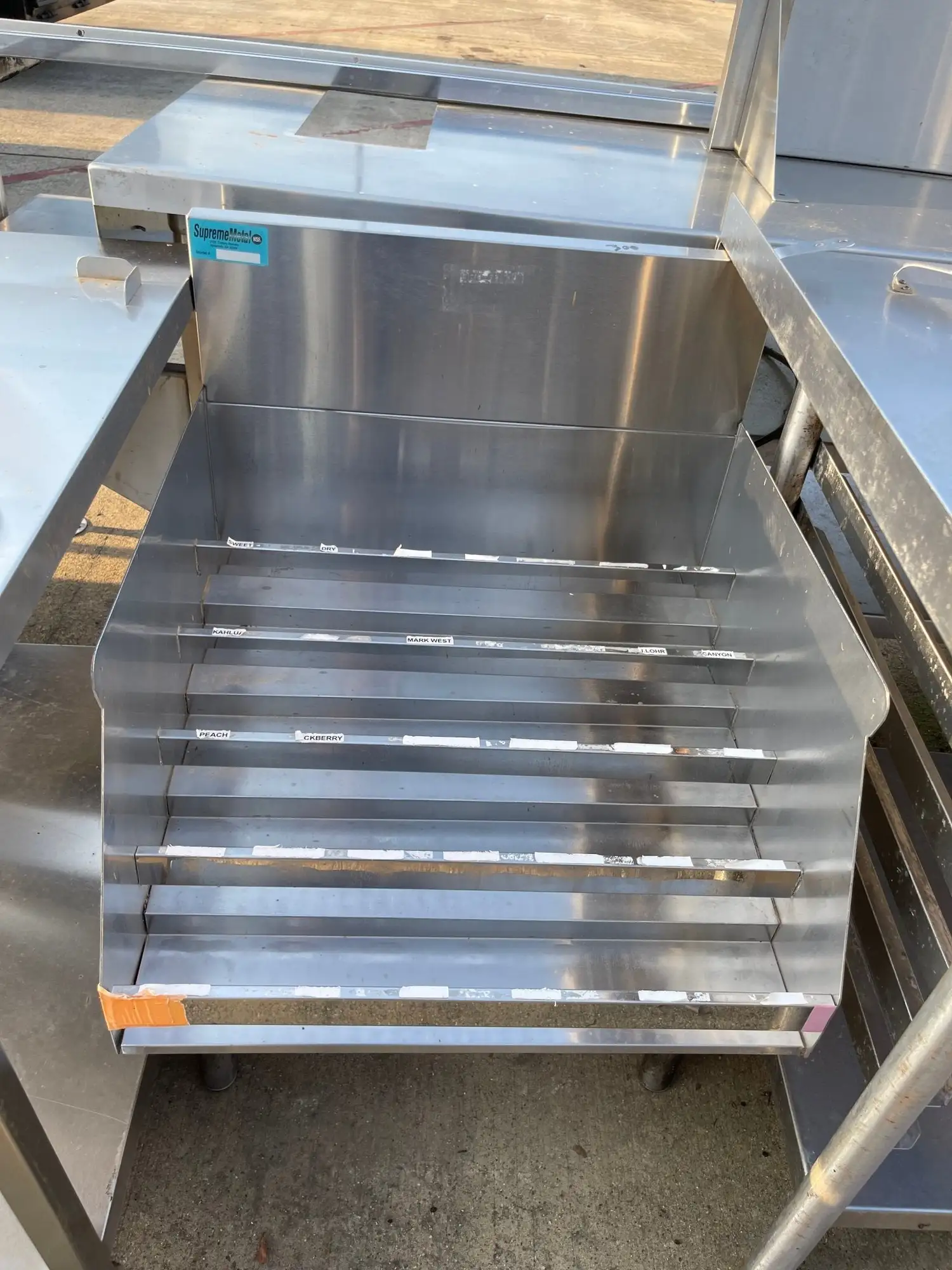 Used Supreme Metal Used 24" Supreme Metal Stainless Steel Bottle Rack - SS222 Racks/Shelving Illinois US | Falcon Restaurant Supply #1376001