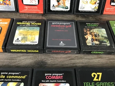 19 - Atari Video Games & 2 Paddle Controllers - see description for more info