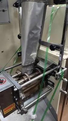 Sunshine Machinery  Vertical form fill and Seal with AMS auger filler