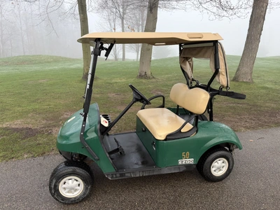 (1) 2017 E-Z-Go golf cart with a Kawasaki gas engine, model 625111G01, includes canopy, ball cover, ...