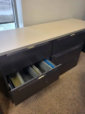 Two 3-drawer file cabinets with Shared Counter