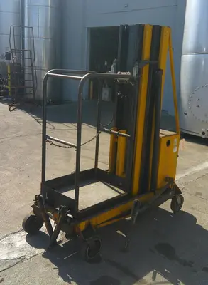 SPC9264  Miscellaneous Equipment Workforce Products Inc Bil Jax vertical mast man lift model  XLT-1951 18' 11" lift height, lift height, 300 lbs capacity