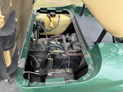 (1) 2014 E-Z-Go golf cart with a Kawasaki gas engine, does not include Club canopy or ball washer, f...