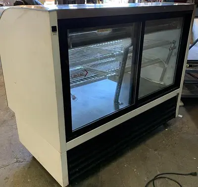 57" WIDE TOR REY CURVED GLASS SHOWCASE