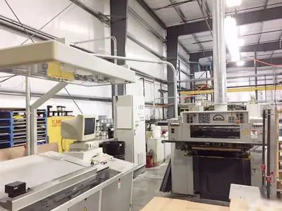 Man Roland R 305 Five color 23 x 29 Inch Sheet