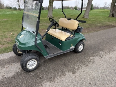 (1) 2015 E-Z-Go golf cart with a Kawasaki gas engine, does not include Club canopy, includes ball wa...