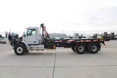 New | in-Stock 2027 PETERBILT 548 Rolloff Trucks Texas US | Roll Off Truck World #1492000