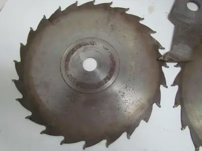 Carbide 12" Dia x Up To 1-3/4" Wide 1-1/8" Bore (6) 1/4" Chippers (2) 1/8"Blades