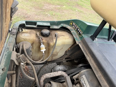 (1) 2015 E-Z-Go golf cart with a Kawasaki gas engine, does not include Club canopy, includes ball wa...