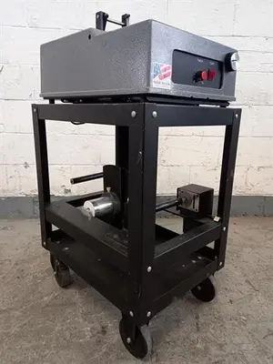 Advent model 310 semi-automatic pressure sensitive wraparound labeler