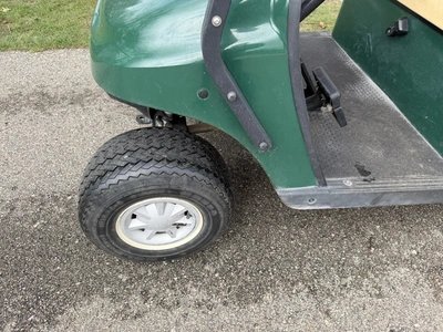 (1) 2015 E-Z-Go golf cart with a Kawasaki gas engine, includes Club canopy and ball washer, fold-dow...