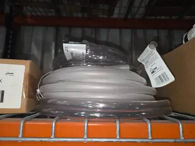 Shelf of magnetic door holders, hose, cords