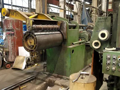 30,000 LB X 36" WIDE X 4" ARBOR  PAXSON SLITTING LINE. STOCK #0741122.
