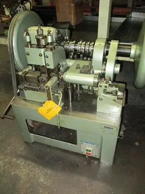 8516-100 OMBI Model FTR Boston Link Chain Machine