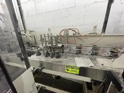 Bartelt model IM7-12 Pouch Packager with AMS Auger Filler