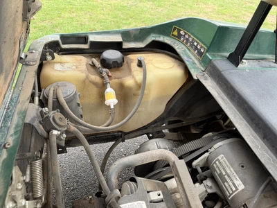 (1) 2015 E-Z-Go golf cart with a Kawasaki gas engine, includes canopy, fold-down windshield, and bal...