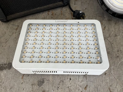 Crate XT15R speaker, a Cooper 120-347V hanging light, and a London LWINGL10001 1000W LED grow light