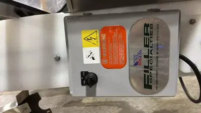 USED FILLER SPECIALTIES BOTTLE FILLING SYSTEM