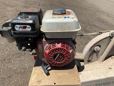 EDCO gas powered block saw model GMS14A-55H, no blade, Honda gas engine with recoil start, takes a 1...