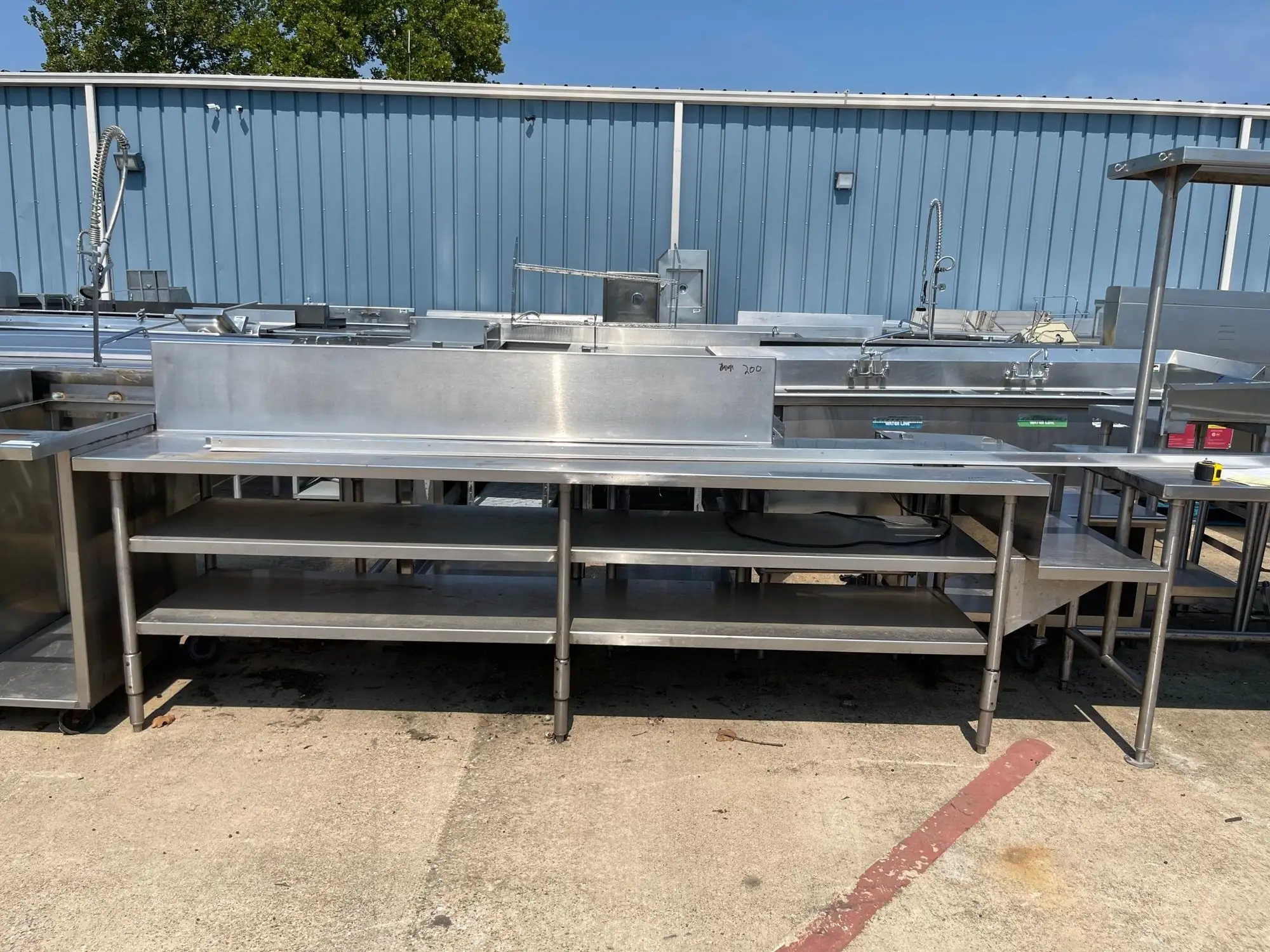 Used Southern Stainless Used 128" Stainless Steel Table Counter with Shelves - SS238 Food Prep Tables Illinois US | Falcon Restaurant Supply #1375931