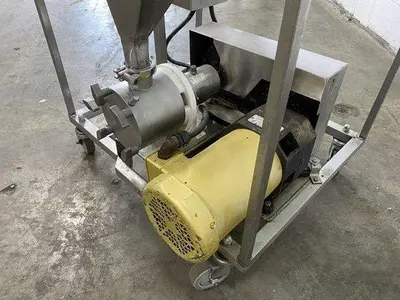 Progressive Cavity Pump With Hopper