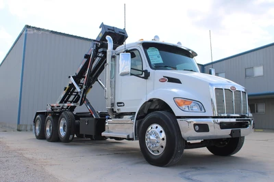 New | in-Stock 2027 PETERBILT 548 Rolloff Trucks Texas US | Roll Off Truck World #1492013