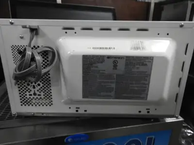 Used Emerson Used Emerson 700 Watt 0.7 Cubic Feet Microwave Oven MW7300W 120V Ovens Illinois US | Falcon Restaurant Supply #1376550