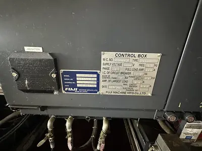 Used FUJI ANW 35 TWIN TURRET CNC LATHE, TAIL STOCK WITH ROBOT LOAD/UNLOAD AND STOCKER TABLES CNC Lathes | Harbor Machinery Inc. #1283396