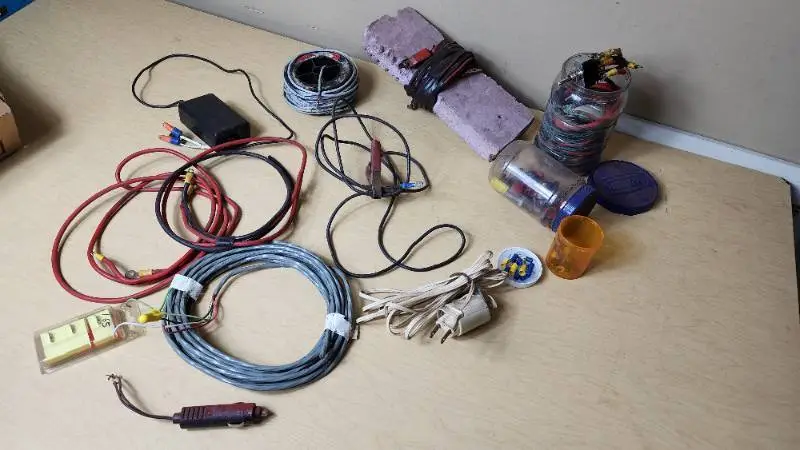 Mixed Electrical Components and Accessories including Various Cables, Connectors, and Switches