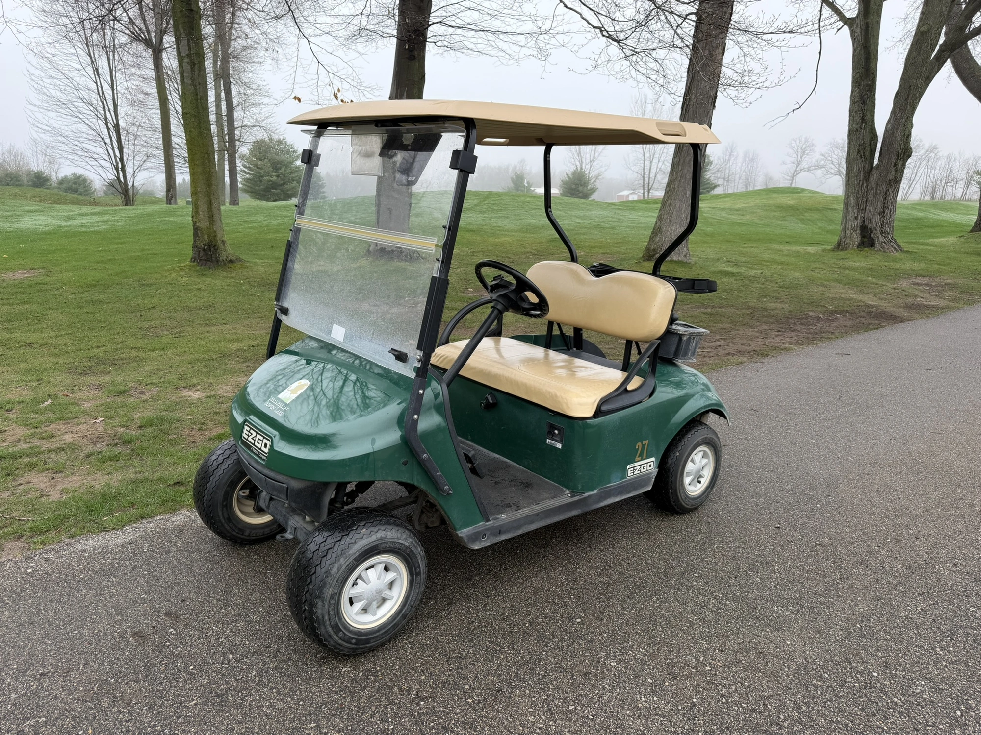 (1) 2015 E-Z-Go golf cart with a Kawasaki gas engine, does not include Club canopy, includes ball wa...