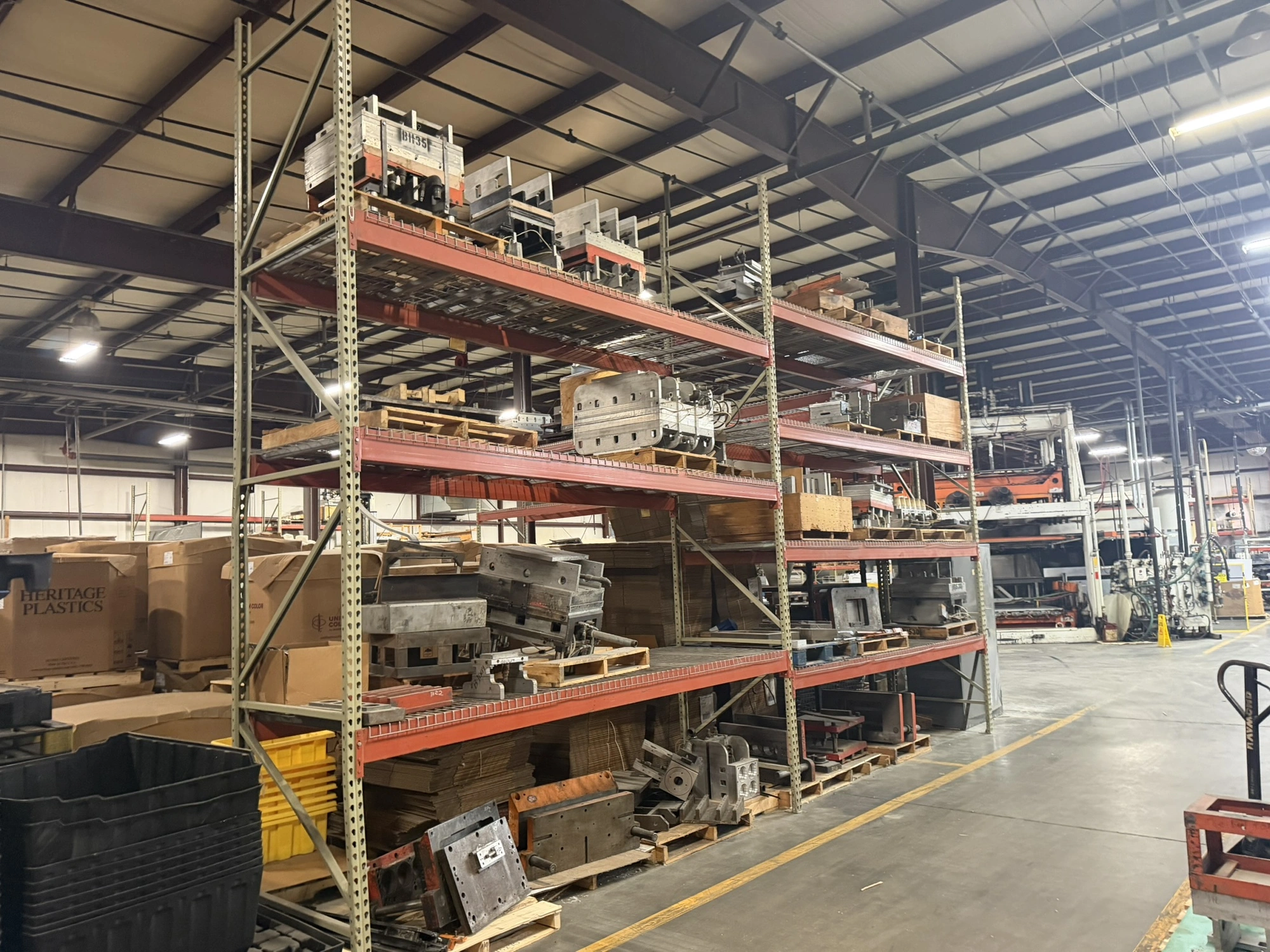 (2) sections of Teardrop style pallet racking, includes (3) 42" deep x 16' tall uprights, (14) 12' c...