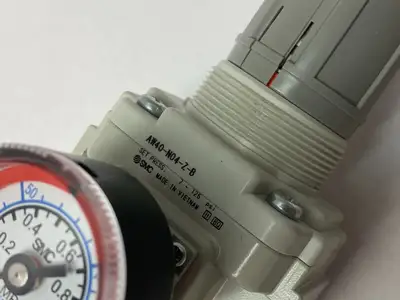 USED SMC MODULAR FILTER REGULATOR W/ GAUGE 7-125PSI SET PRESS