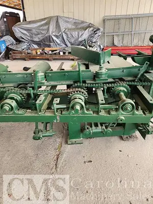 USED NEWMAN M-255 AUTOMATIC FEED TABLE