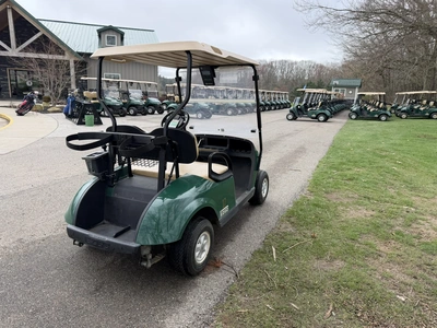 (1) 2015 E-Z-Go golf cart with a Kawasaki gas engine, does not include Club canopy, includes ball wa...