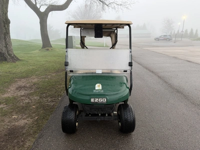 (1) 2015 E-Z-Go golf cart with a Kawasaki gas engine, includes canopy, ball cover, club cover, fold-...