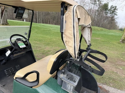 (1) 2015 E-Z-Go golf cart with a Kawasaki gas engine, includes Club canopy and ball washer, fold-dow...