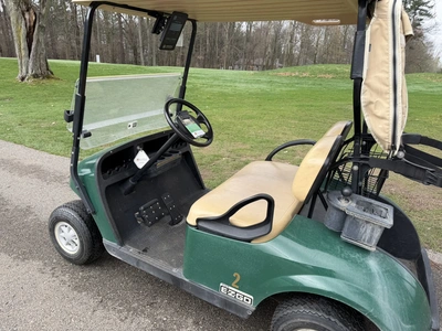(1) 2015 E-Z-Go golf cart with a Kawasaki gas engine, includes Club canopy and ball washer, fold-dow...